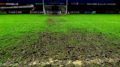 The pitch at Healy Park after the game was abandoned