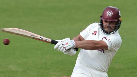 Ricardo Vasconcelos, playing for Northants, swings his bat to connect with the ball