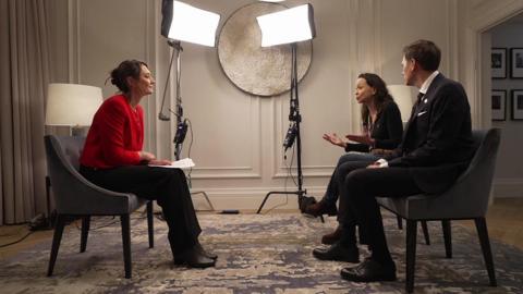 Lucy Hockings interviewing Machado and Frydnes, with big studio lights in the background.