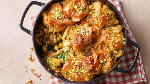 Courgette, pistachio and olive filo pie