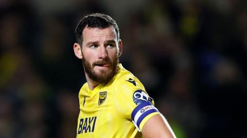 Elliott Moore is looking forward to a seventh season at the Kassam Stadium