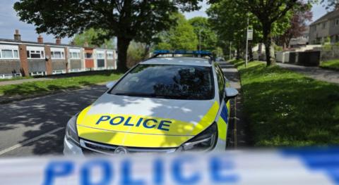 Police car at the scene of the bomb site in Plymouth