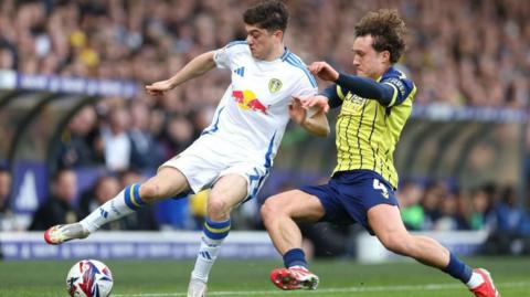 Leeds United's Welsh winger Daniel James is challenged by West Bromwich Albion hard man Callum Styles