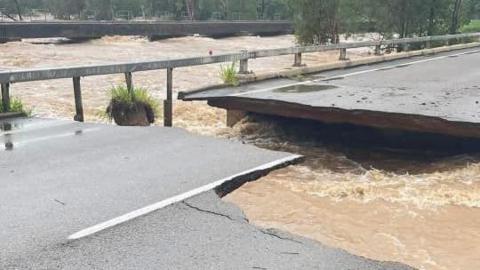 A section of Queensland's main Bruce Highway that collapsed in the floods