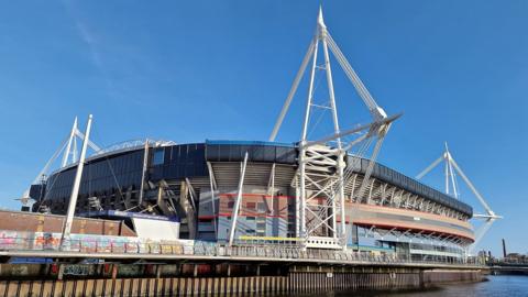 A football stadium in Cardiff, with four white scaffolds around a large arena