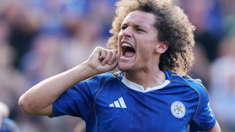 Wout Faes celebrates scoring