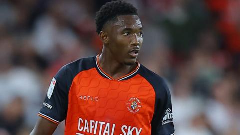 Christ Makosso playing for Luton Town