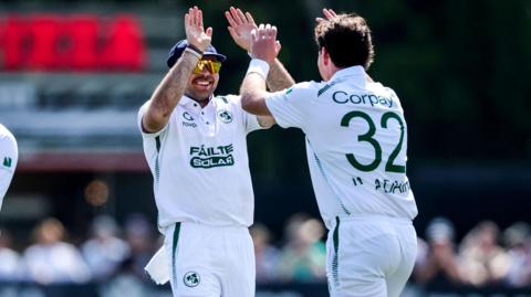 Mark Adair celebrates