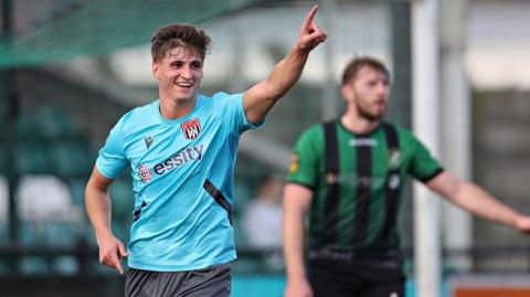 Elliot Reeves celebrates one of his two goals for Flint against Aberystwyth