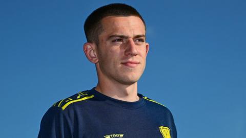 Burton defender Finn Delap