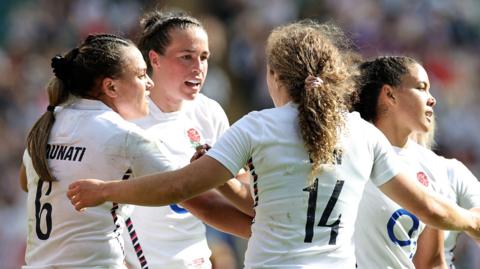 England women's rugby union team celebrate