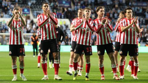 Sunderland players clap their fans after the 2-1 win at Coventry in the Championship play-off semi-final first leg