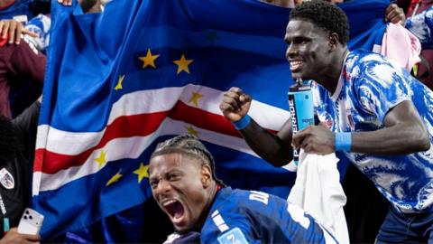 Nuno Da Costa (L) and Joao Paulo of Cape Verde (R) celebrate advancing to the next round during the World Cup match between Cape Verde and Saudi Arabia at NRG Stadium in Houston 