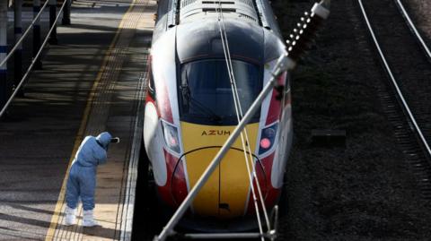 Forensic officer taking picture