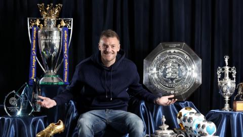 Jamie Vardy sits with his trophies
