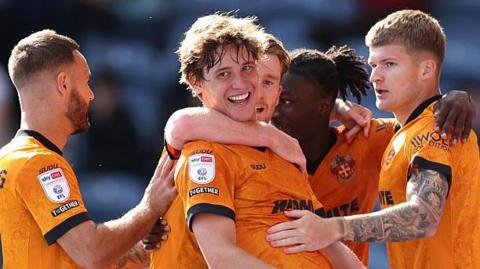 Fer Lopez (centre) celebrates with team-mates after scoring against Preston