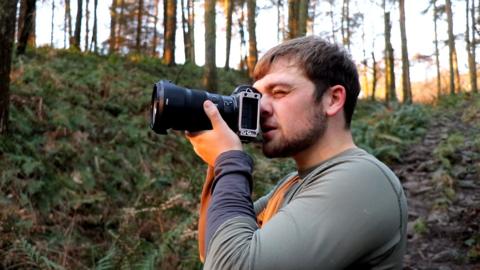 William Hickie taking a photograph