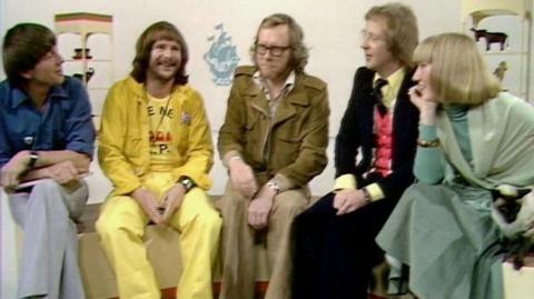 The Goodies members Bill Oddie, Graeme Garden and Tim Brooke-Taylor are flanked by Blue Peter presenters John Noakes and Lesley Judd.