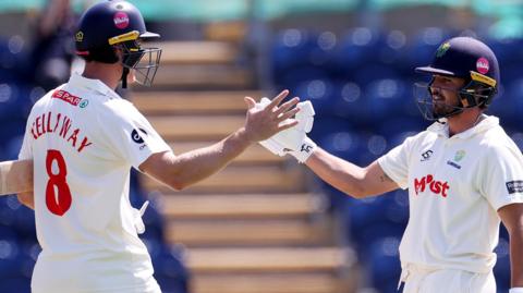 Ben Kellaway and Kiran Carlson of Glamorgan celebrate
