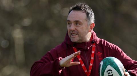 Matt Sherratt gives instructions in Wales training