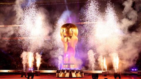 A giant Fifa World Cup trophy on display at the 2022 Qatar World Cup.