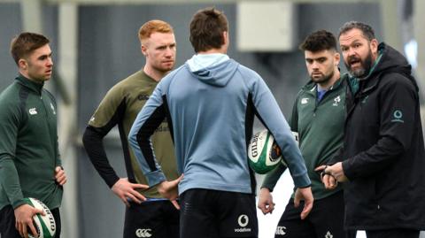 Andy Farrell speaks with his players in training