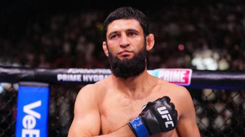 Khamzat Chimaev celebrates beating Robert Whittaker in October