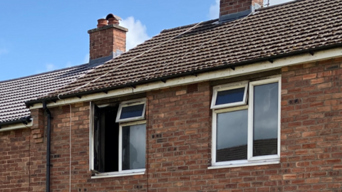 Fire-damaged house in Wrexham