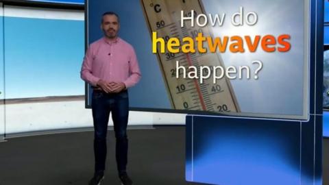 Ben Rich stands in front of a screen which says 'How  do heatwaves happen?'