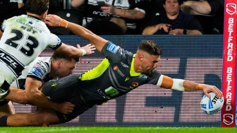 Catalans Dragons winger Tommy Makinson scores a try