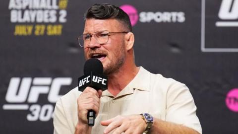 Michael Bisping speaks on a UFC microphone