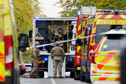 Close up shot of emergency services working at the scene in Prestwich