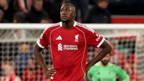 Ibrahima Konate looks deflated after Liverpool's defeat by Manchester City
