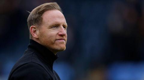 Shrewsbury Town boss Gavin Cowan on the touchline