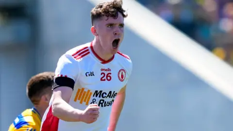 Eoin McElholm of Tyrone celebrates his goal