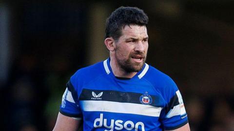 Charlie Ewels standing on the pitch during a Prem Rugby Cup game for Bath