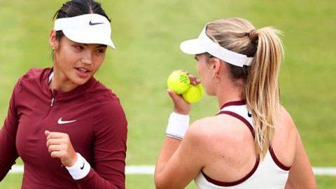 Emma Raducanu and Katie Boulter talk to each other in doubles match