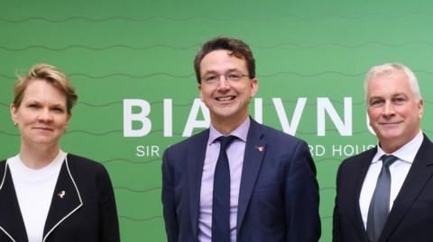 The three deputies stood together. Sasha Kazantseva-Miller is stood on the left, Deputy Andrew Niles in the middle and Deputy Kirstin Morel on the right.