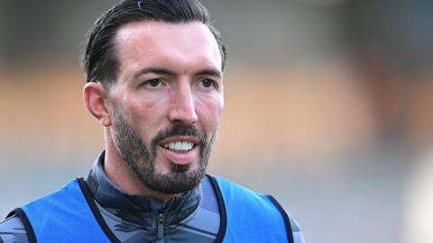 Ryan Bowman during a warm-up before a match