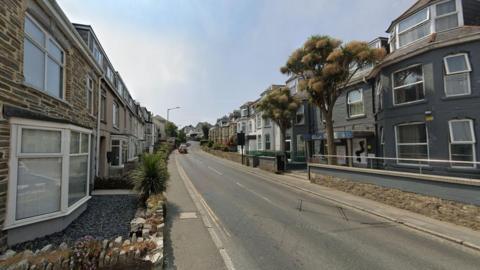 This is a screenshot of Berry Road in Newquay which shows houses along the road on a normal day.