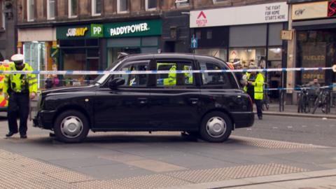 black cab at scene of the collision