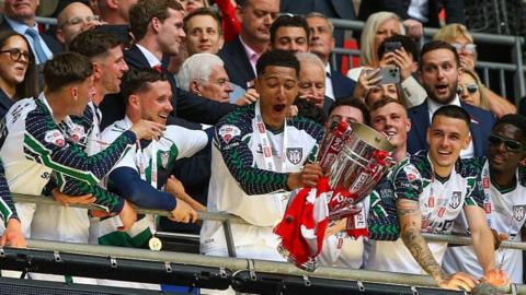 Sunderland lift the play-off final trophy