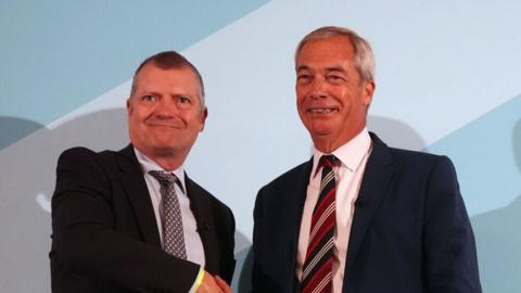 Nigel Farage and Graham Simpson shake hands