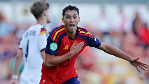 Hugo Lopez celebrates after scoring for Spain