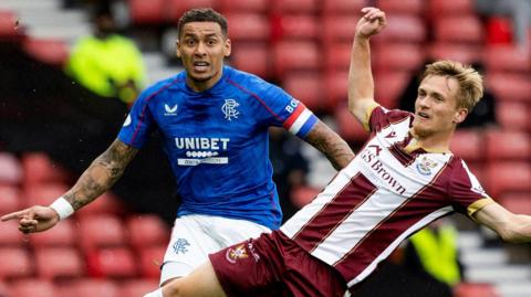 Rangers' James Tavernier and St Johnstone's Matt Smith