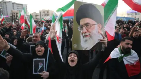 Mourners react to death of Iran supreme leader in Tehran, Iran, on 1 March 2026