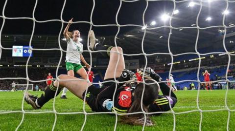 Republic of Ireland celebrate as Olivia Clark scores an own goal