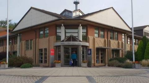 Avon & Somerset Police HQ - two-tone brick building with corner entrance