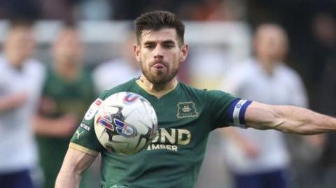 Plymouth Argyle's Joe Edwardsduring the Sky Bet Championship match between Plymouth Argyle and Preston North End at Home Park on March 16, 2024 in Plymouth, England