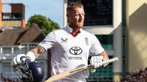 England captain Ben Stokes raises his bat and helmet after leaving the field at Trent Bridge 